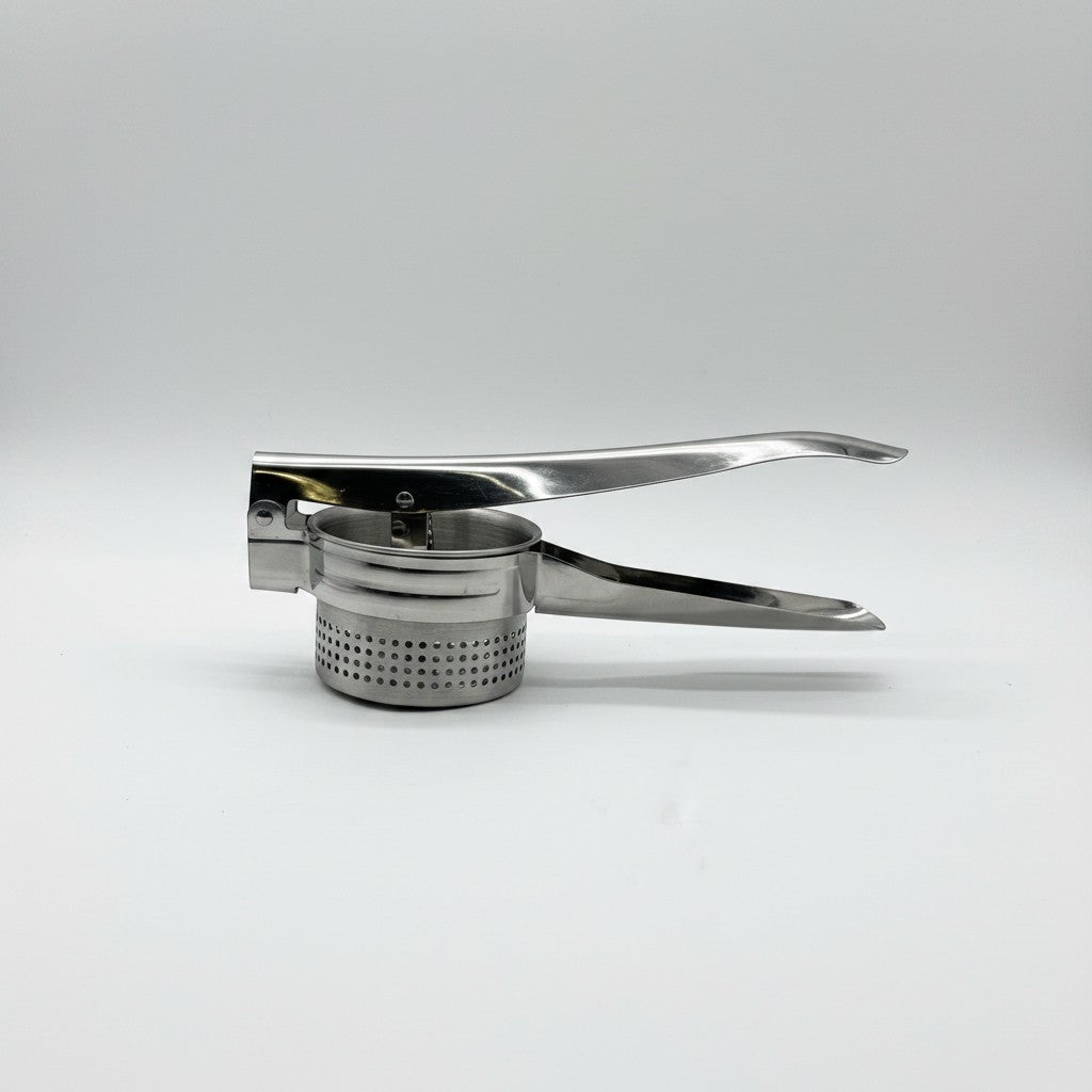 Schiacciapatate manuale Mr Bob - Home & Tech Utility in acciaio inox con fori per purè omogeneo