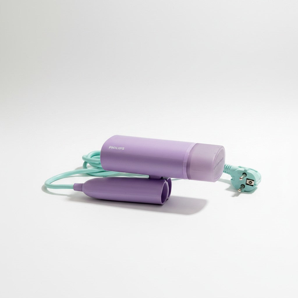 Stiratore a vapore portatile Philips STH3010/30 color lilla con cavo turchese, venduto da Mr Bob - Home & Tech Utility